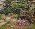 Niños en un jardín en eragny 1897 Camille Pissarro